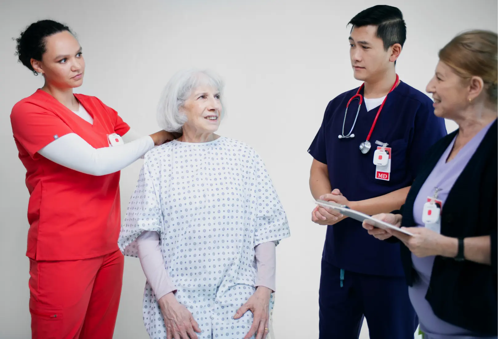 group of nurses and doctors taking care of the patient