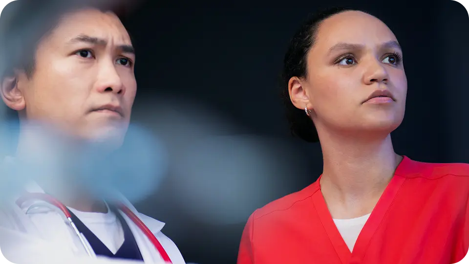 two nurse workers looking