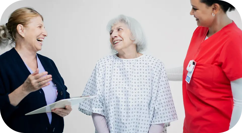 happy patient and hospital staff after reducing length of stay